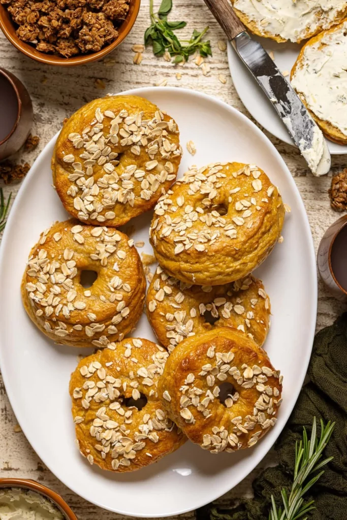 Homemade pumpkin oat bagels with warm autumn spices and a fluffy texture